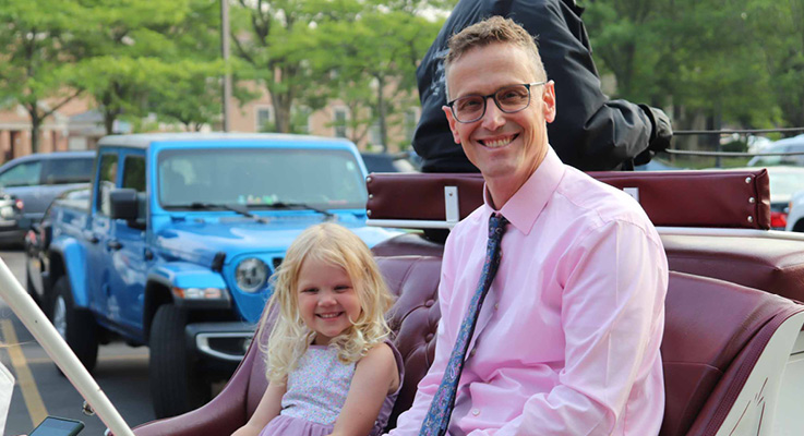 Daughter and father carriage ride